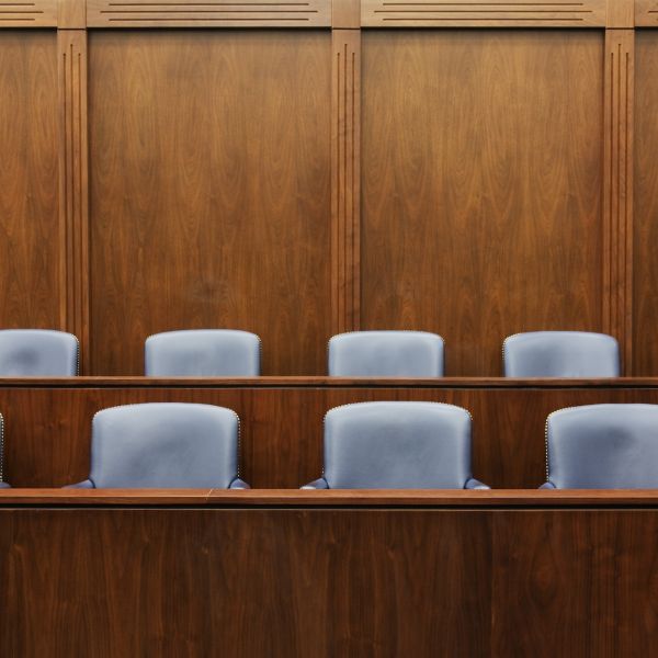 Empty Jury Seats in Courtroom