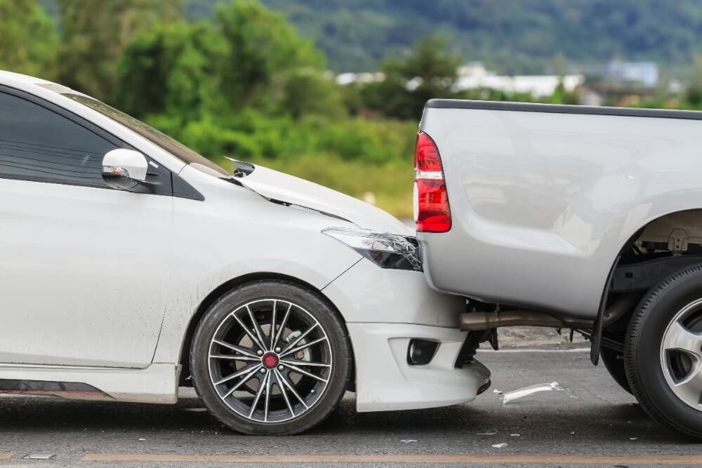 Car rear ending a truck