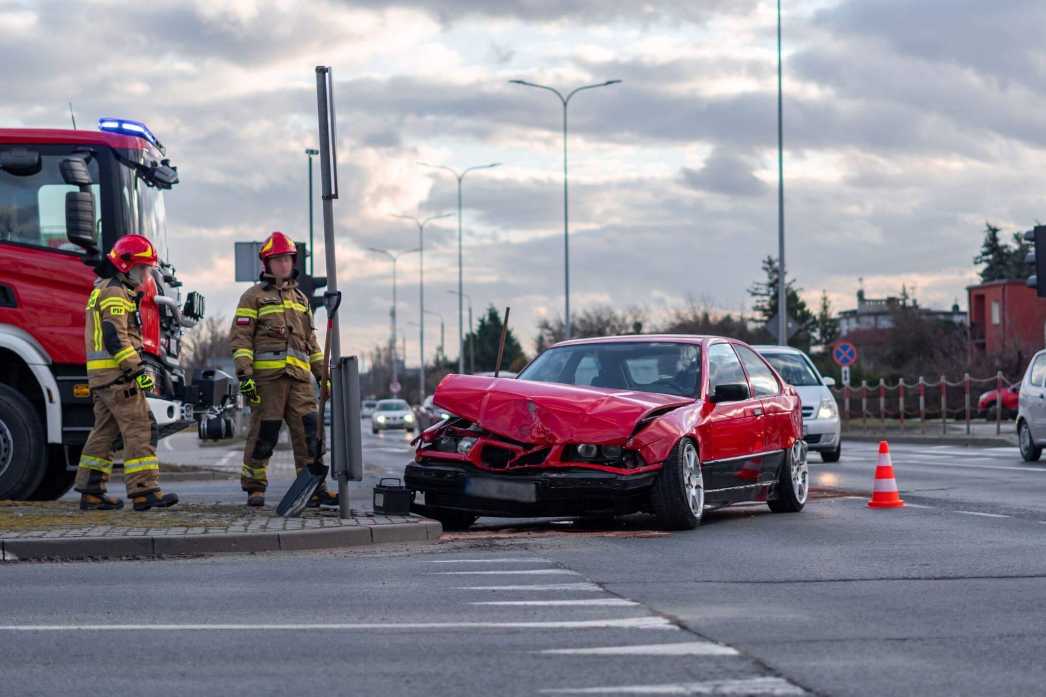 a car that has crashed into a fire hydrant