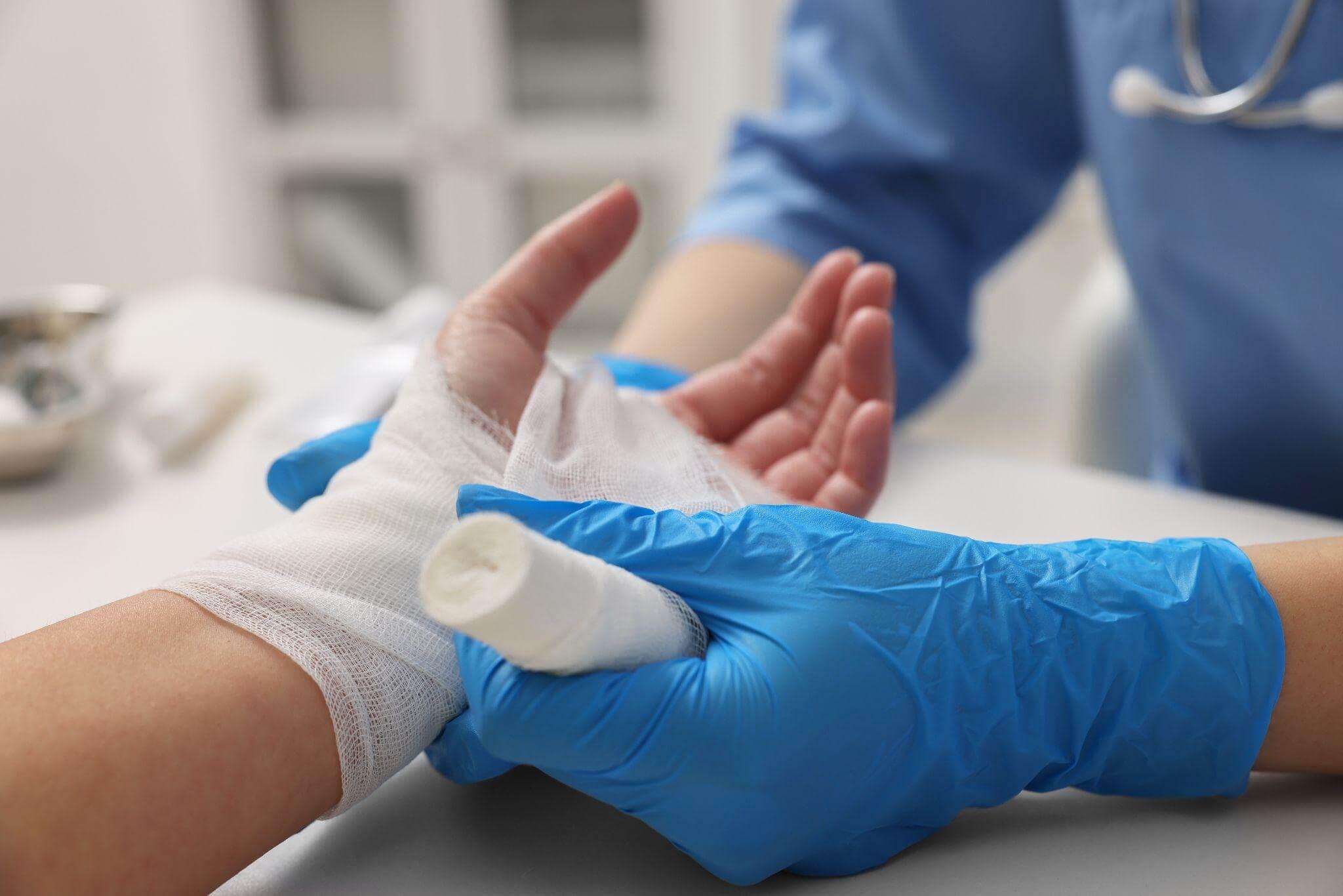 Person wearing blue and white gloves for legal work